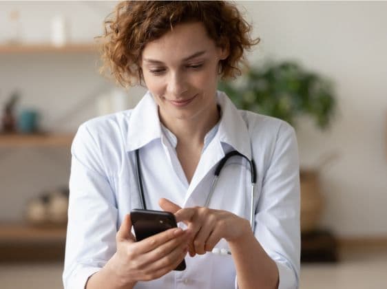 person smiling on mobile