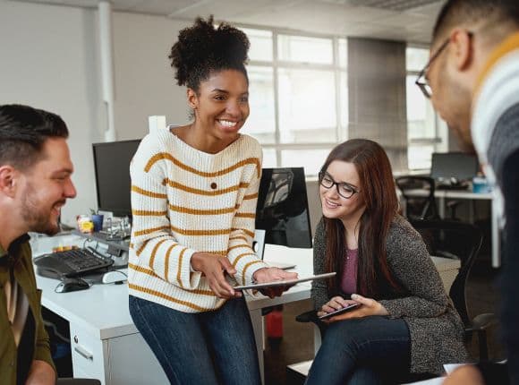 Group of employees together using Emburse Certify Expense